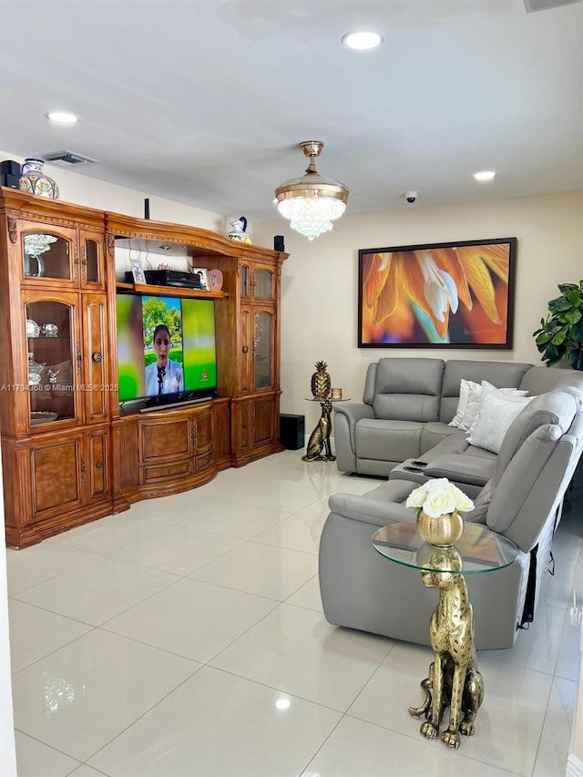 living room with tile patterned flooring, recessed lighting, and visible vents