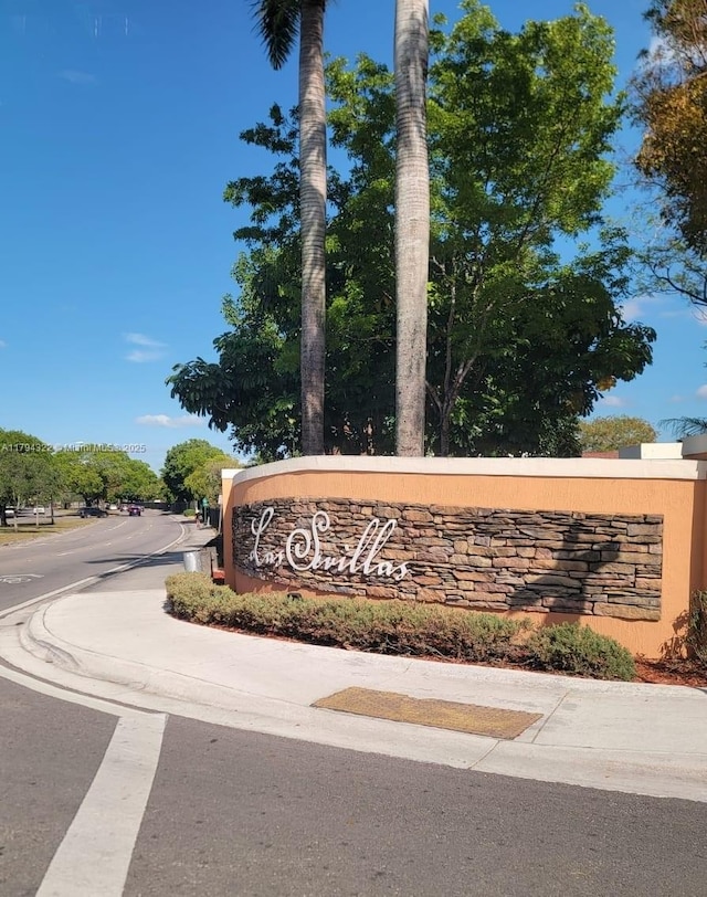 view of community sign