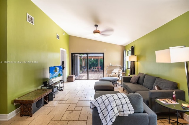563 Lakeside Cir, Sunrise, FL 33326 - living area with stone tile flooring, lofted ceiling, a ceiling fan, and baseboards