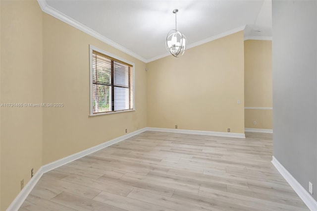 unfurnished room with crown molding, baseboards, a chandelier, and light wood finished floors