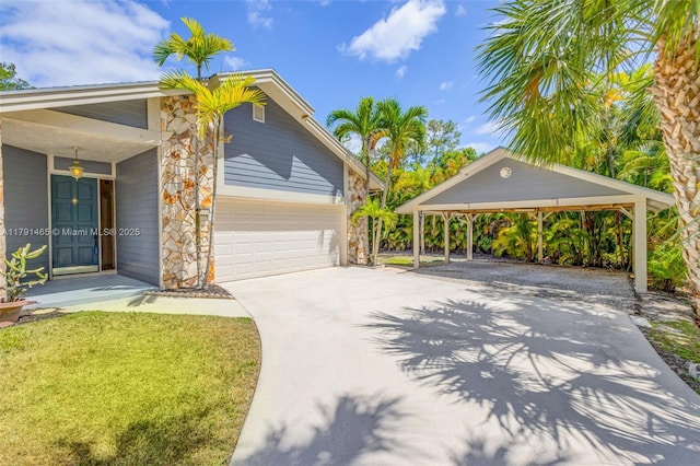 16789 98th Way N, Jupiter, FL 33478 - view of side of property featuring concrete driveway, an attached garage, stone siding, a carport, and a gazebo
