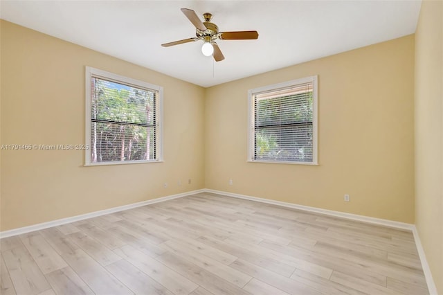 16789 98th Way N, Jupiter, FL 33478 - spare room with baseboards, light wood-style flooring, and a ceiling fan