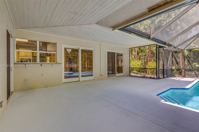 16789 98th Way N, Jupiter, FL 33478 - swimming pool with a patio area and glass enclosure