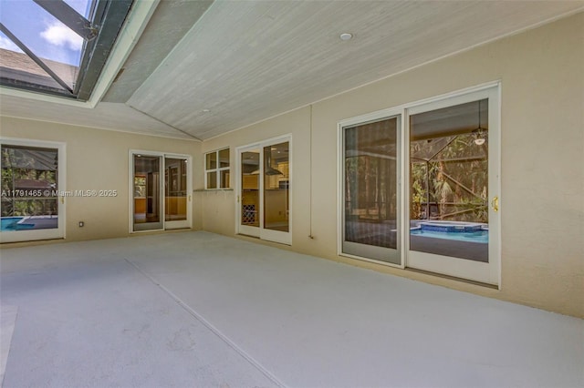 16789 98th Way N, Jupiter, FL 33478 - unfurnished sunroom with lofted ceiling