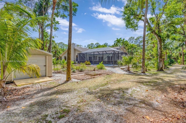 16789 98th Way N, Jupiter, FL 33478 - view of yard featuring glass enclosure