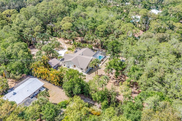 drone / aerial view with a forest view