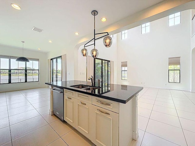 kitchen featuring plenty of natural light, a sink, and open floor plan
