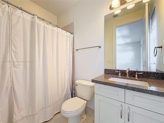 full bath with vanity, tile patterned floors, visible vents, and toilet