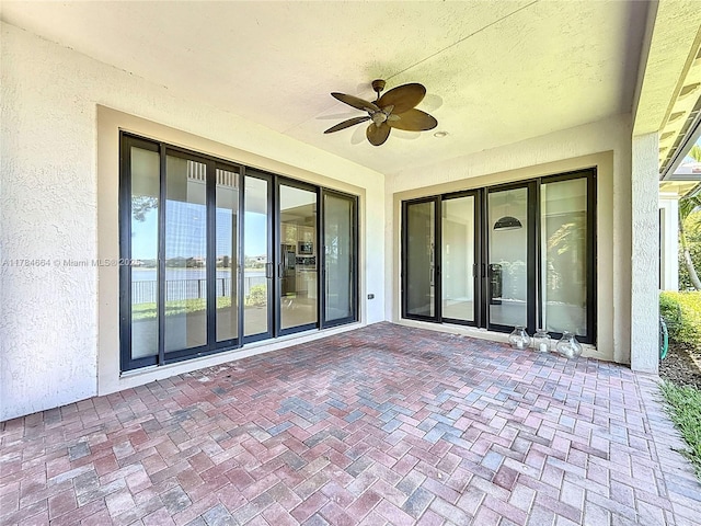 view of patio / terrace featuring a ceiling fan