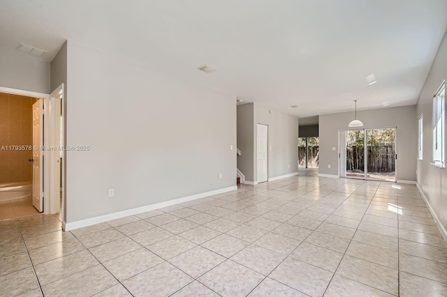 1107 NE 41st Ave, Homestead, FL 33033 - spare room featuring baseboards, visible vents, and light tile patterned floors
