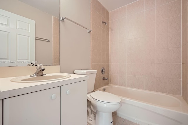 bathroom featuring vanity, shower / bathing tub combination, tile patterned floors, and toilet
