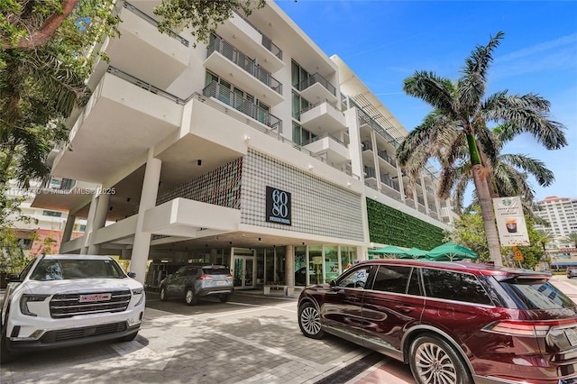 view of property with covered parking