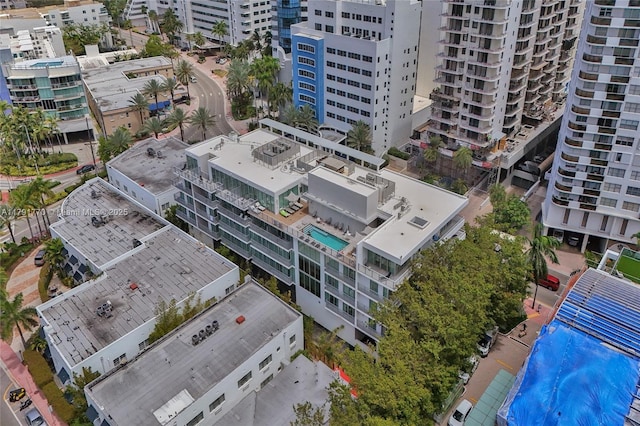birds eye view of property featuring a view of city