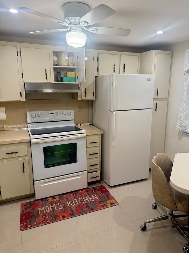 kitchen featuring white appliances, light countertops, a ceiling fan, recessed lighting, and under cabinet range hood