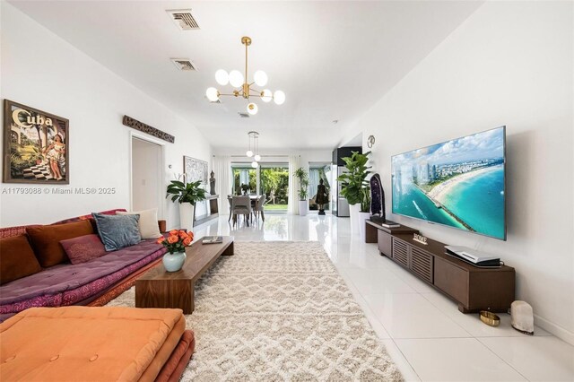 480 NW 88th Ter, El Portal, FL 33150 - living area featuring a chandelier, light tile patterned floors, visible vents, and baseboards