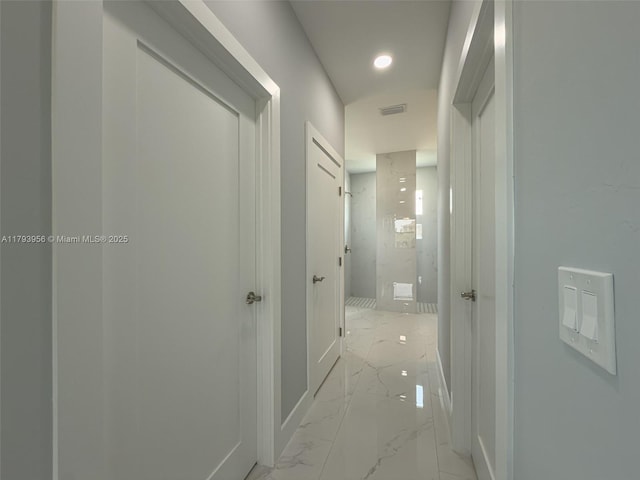417 Paddock St, Lehigh Acres, FL 33974 - hall featuring light marble finish floors and baseboards