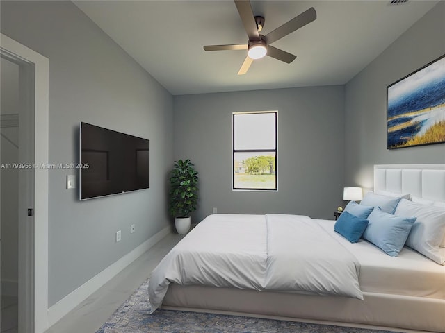 417 Paddock St, Lehigh Acres, FL 33974 - bedroom with marble finish floors, baseboards, and a ceiling fan