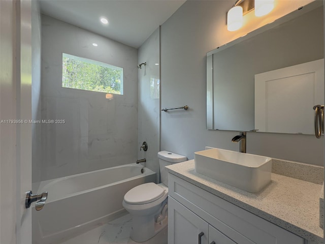 417 Paddock St, Lehigh Acres, FL 33974 - full bathroom with toilet, vanity, washtub / shower combination, marble finish flooring, and recessed lighting