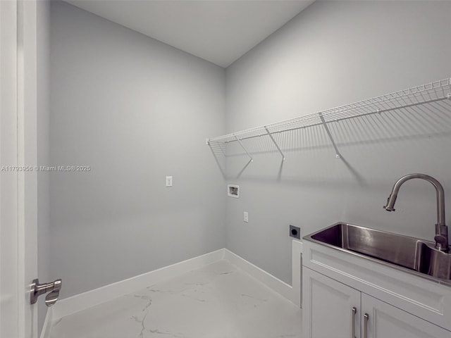 417 Paddock St, Lehigh Acres, FL 33974 - laundry room featuring hookup for a washing machine, baseboards, cabinet space, electric dryer hookup, and marble finish flooring