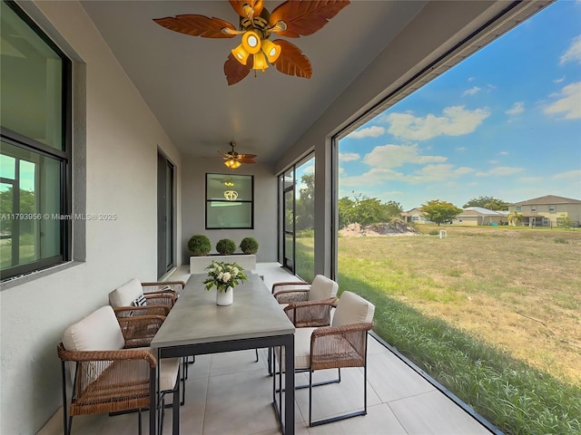 417 Paddock St, Lehigh Acres, FL 33974 - sunroom featuring ceiling fan and tile patterned flooring