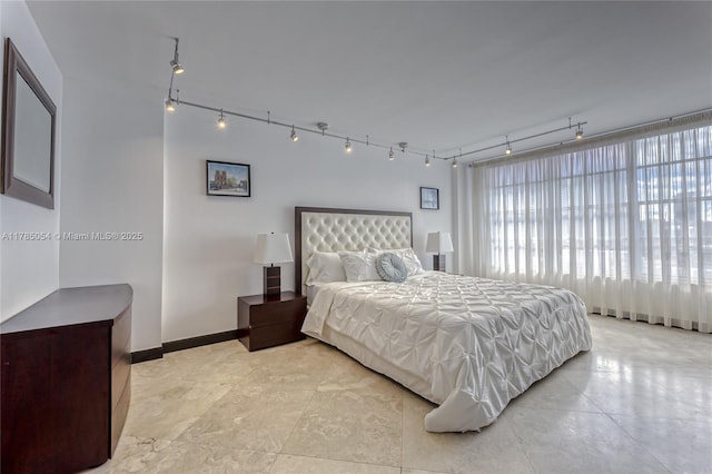 bedroom with baseboards
