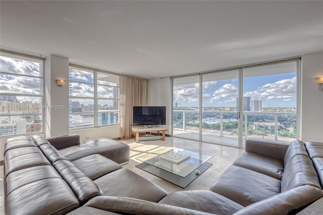 3800 S Ocean Dr Unit 1606, Hollywood, FL 33019 - living area featuring concrete flooring, plenty of natural light, and expansive windows