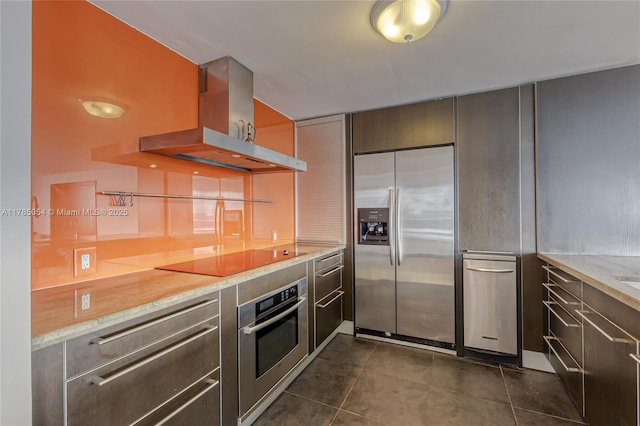 kitchen with dark tile patterned floors, open shelves, appliances with stainless steel finishes, and island range hood