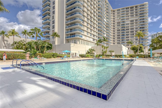 pool with a patio area