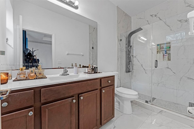 5301 Ellery Ter, West Palm Beach, FL 33417 - full bath with vanity, marble finish floor, a marble finish shower, and toilet