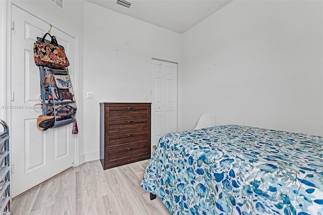 5301 Ellery Ter, West Palm Beach, FL 33417 - bedroom featuring visible vents and light wood-style floors
