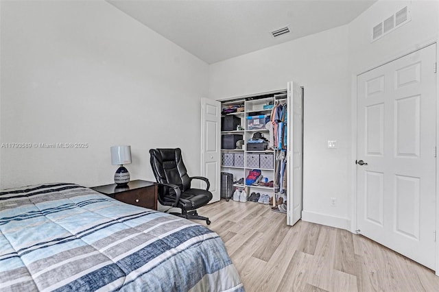 5301 Ellery Ter, West Palm Beach, FL 33417 - bedroom with visible vents, light wood-style floors, baseboards, and a closet
