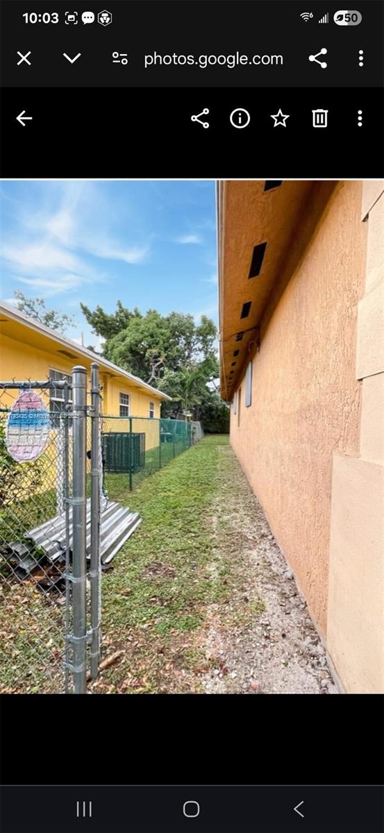 2951 NW 57th St, Miami, FL 33142 - view of yard with fence