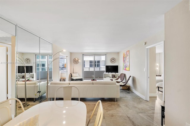 living room with baseboards