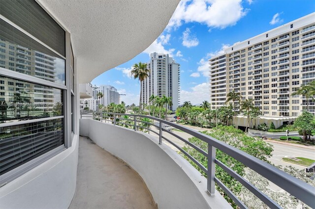 balcony featuring a view of city