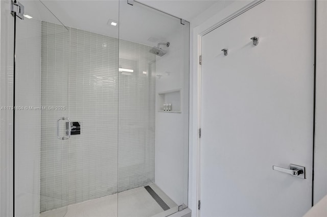 full bathroom featuring a stall shower