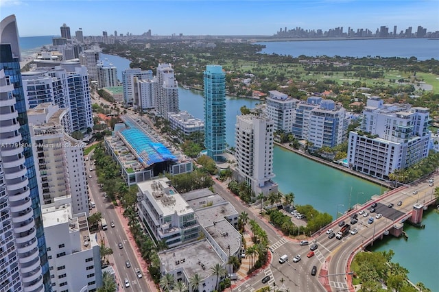 bird's eye view featuring a view of city and a water view