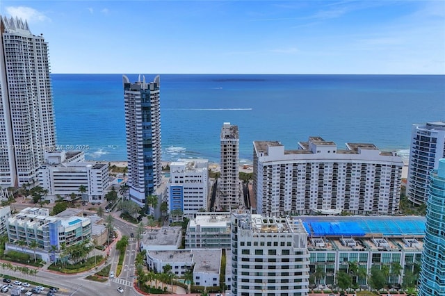 bird's eye view featuring a view of city and a water view