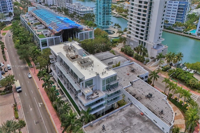aerial view featuring a water view and a city view
