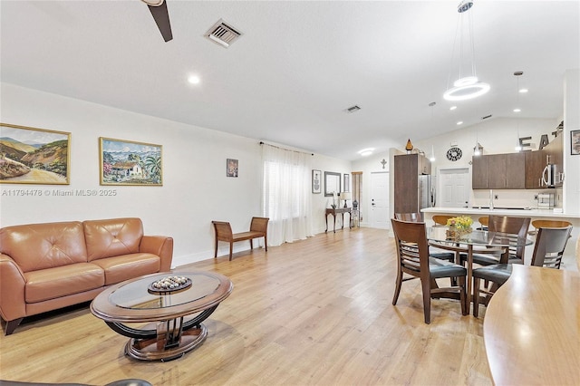 1371 Canary Island Dr, Weston, FL 33327 - living room featuring a ceiling fan, recessed lighting, vaulted ceiling, light wood-type flooring, and visible vents