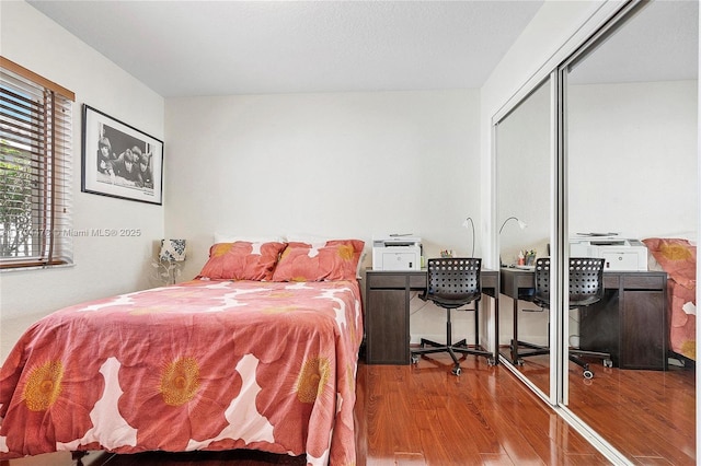 1371 Canary Island Dr, Weston, FL 33327 - bedroom featuring a closet and wood finished floors