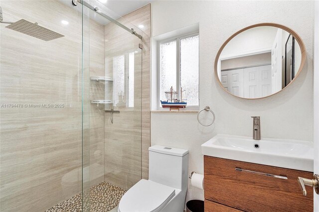 1371 Canary Island Dr, Weston, FL 33327 - bathroom with vanity, a stall shower, and toilet