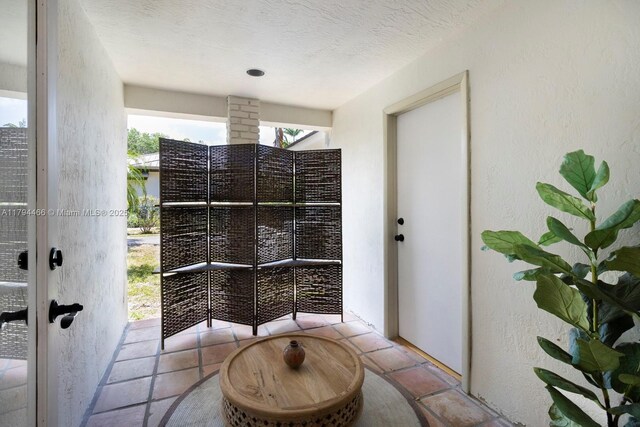 6255 SW 99th Ter, Pinecrest, FL 33156 - exterior space featuring a textured wall