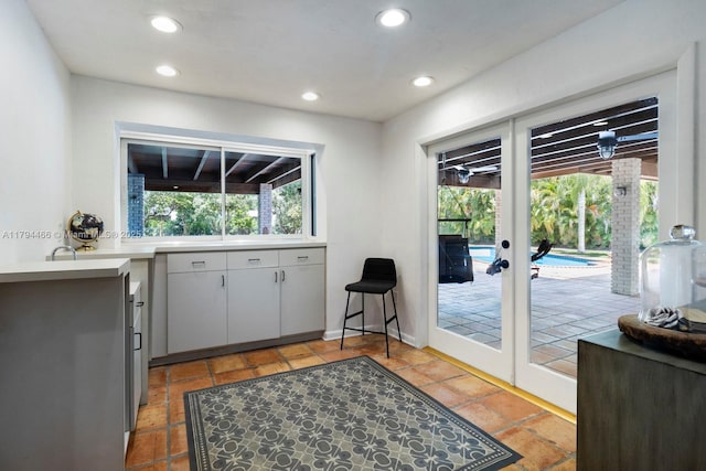 doorway to outside with recessed lighting and french doors