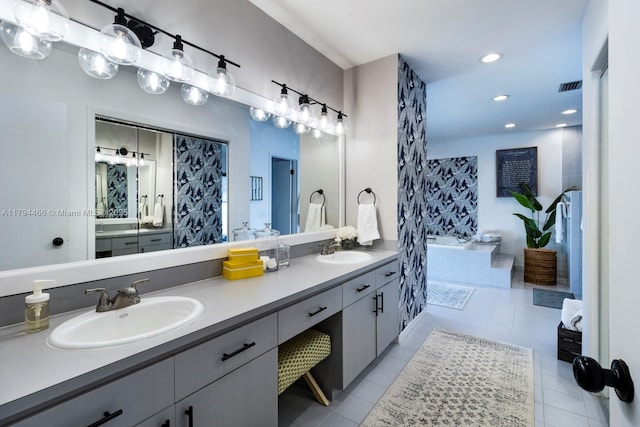 full bath with visible vents, a sink, double vanity, and recessed lighting