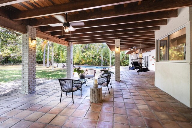 6255 SW 99th Ter, Pinecrest, FL 33156 - view of patio featuring a ceiling fan and an outdoor pool