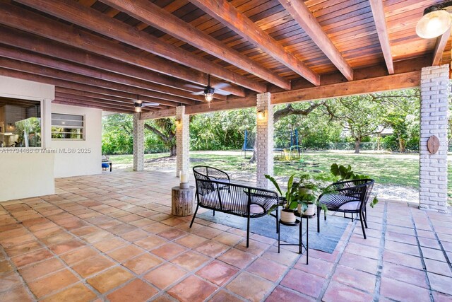6255 SW 99th Ter, Pinecrest, FL 33156 - view of patio / terrace with ceiling fan and fence