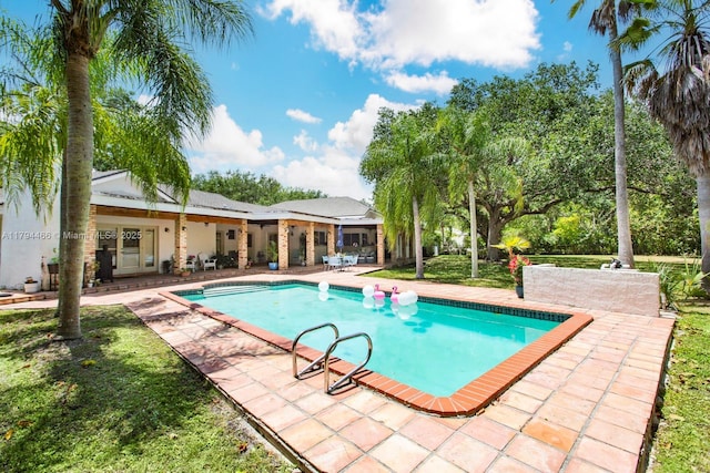 outdoor pool featuring a patio area