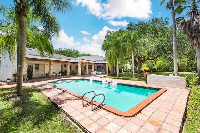 6255 SW 99th Ter, Pinecrest, FL 33156 - outdoor pool featuring a patio area