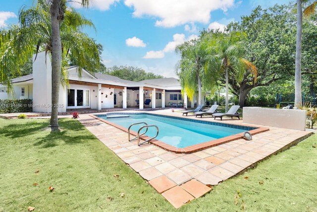 6255 SW 99th Ter, Pinecrest, FL 33156 - pool with a patio and a yard