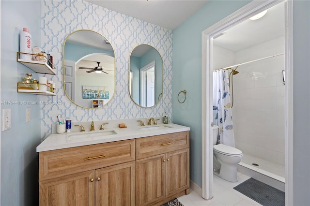 bathroom featuring a sink, a ceiling fan, wallpapered walls, and tiled shower